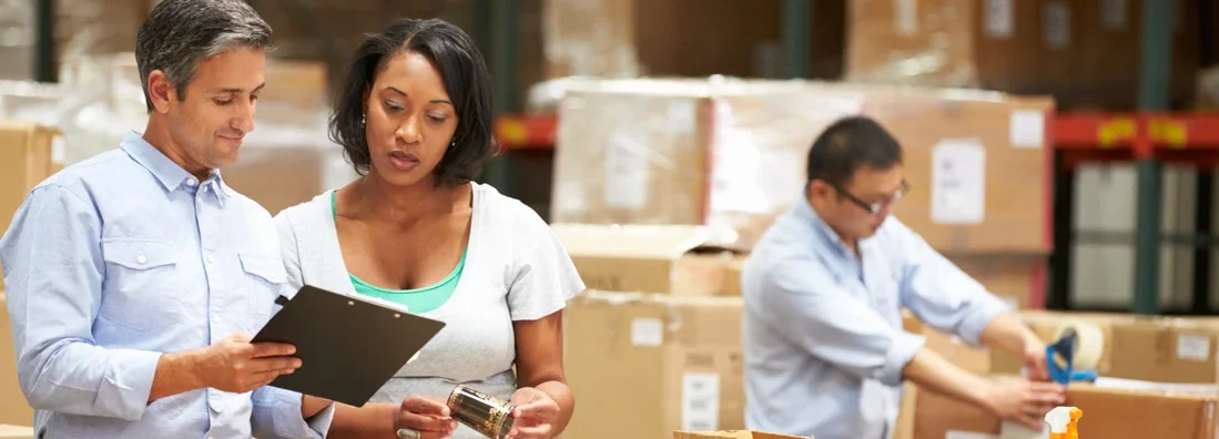 Workers In Warehouse Preparing Goods For Dispatch. Find Bozeman, Montana business insurance. 