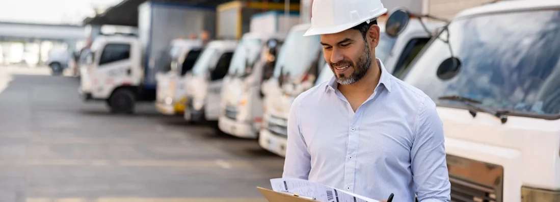 Man working as a supervisor at a distribution warehouse. Best Commercial Auto Insurance.