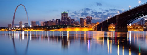 Panoramic image of St. Louis downtown with Gateway Arch at twilight