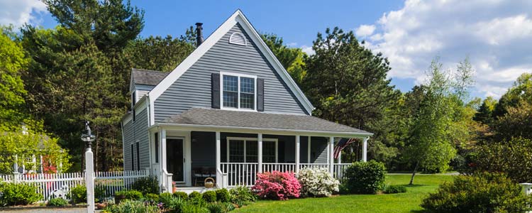 house with nice landscape and fence