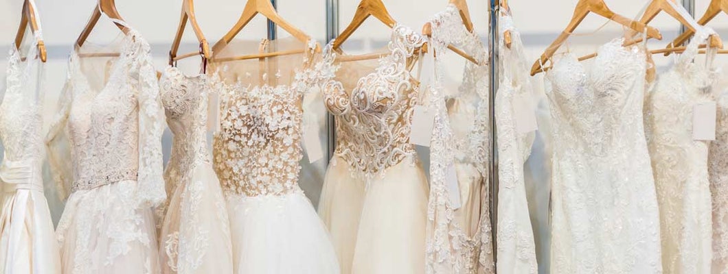 Beautiful wedding dresses in bridal shop. Find Bridal Shop Insurance.