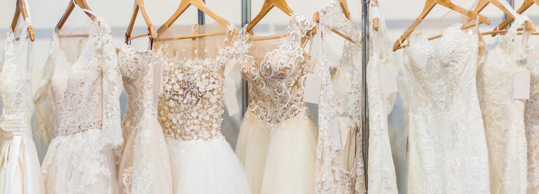 Beautiful wedding dresses in bridal shop. Find Bridal Shop Insurance.