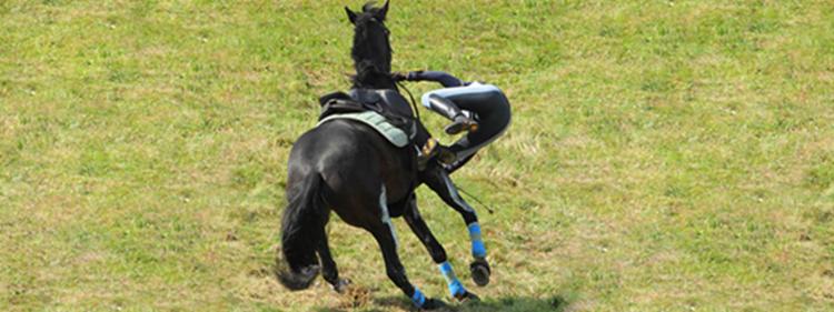 Rider falling off horse