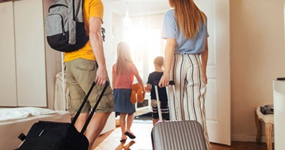 Family leaving their home for a vacation. Vacation Tips before Leaving Town.