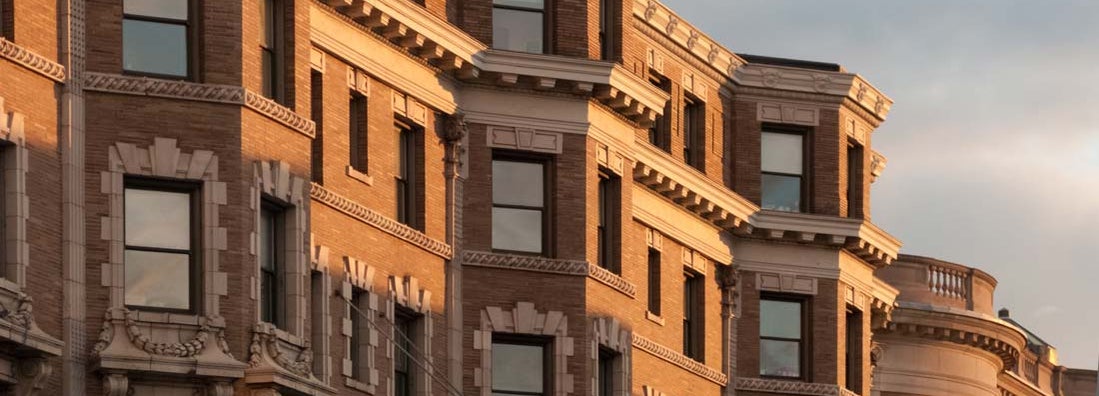 Detail view of Boston's famous brownstone architecture. Find Massachusetts condo insurance.