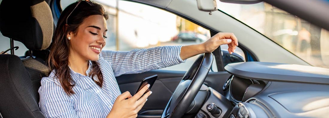 Woman is texting in a traffic jam. Can you get a citation for texting at a stop light in your state.