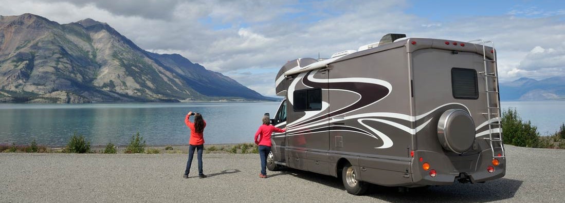 Mother and daughter traveling by RV in Yukon and Alaska. Find Alaska RV Insurance.