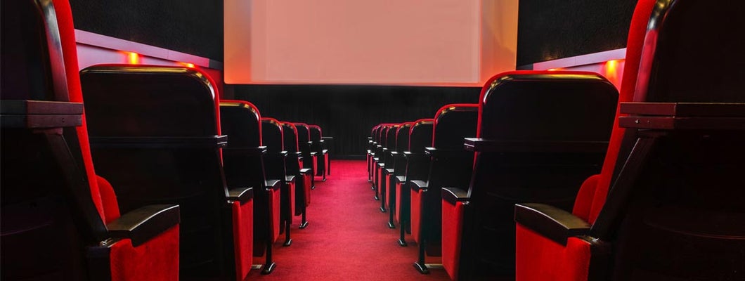 Movie theatre aisle. Find movie theater insurance.