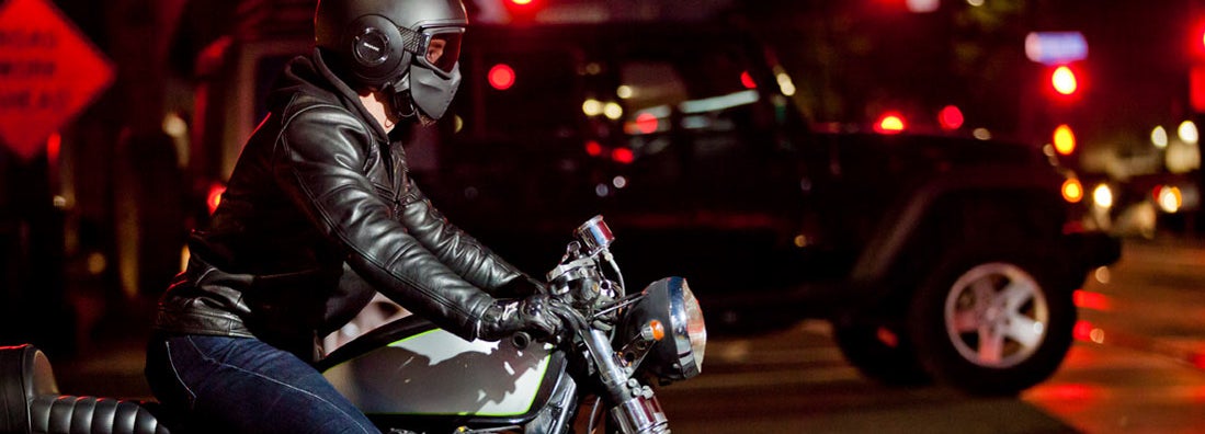 Motorcycle Rider at Night. Find New York motorcycle insurance.