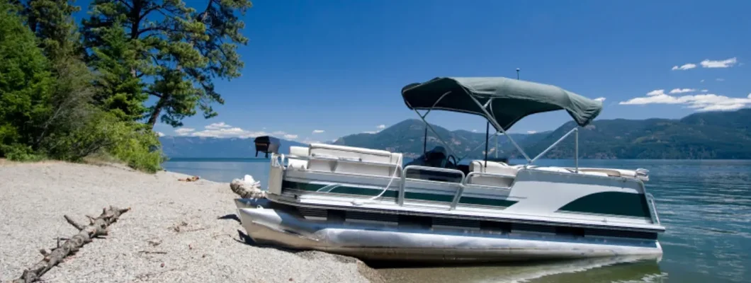 Pontoon on lake. Find Idaho Boat Insurance.