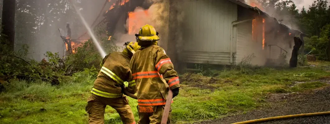 Firefighers and housefire. Find Fire Insurance.