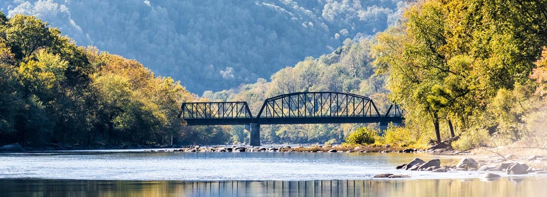 New River Gorge wide canyon water river lake during autumn by Grandview