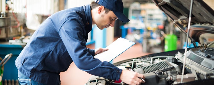 Mechanic at work in his garage