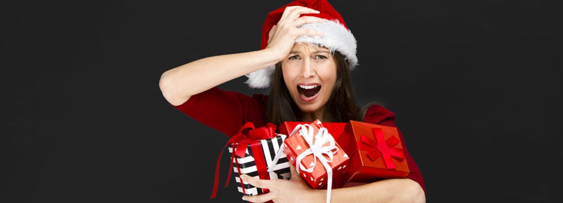 woman holding christmas gifts