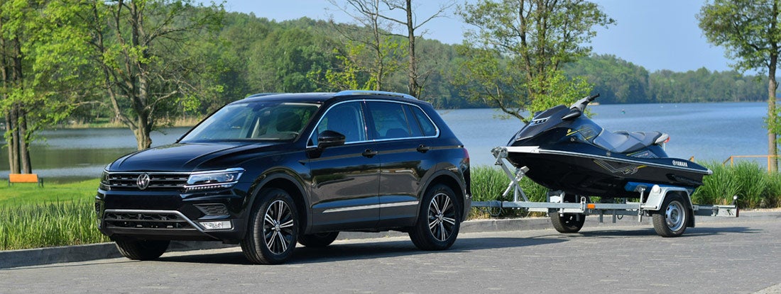 SUV with trailer and jet ski