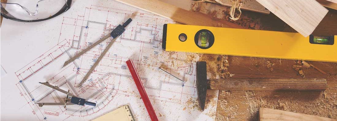Finish carpentry tools on wooden background
