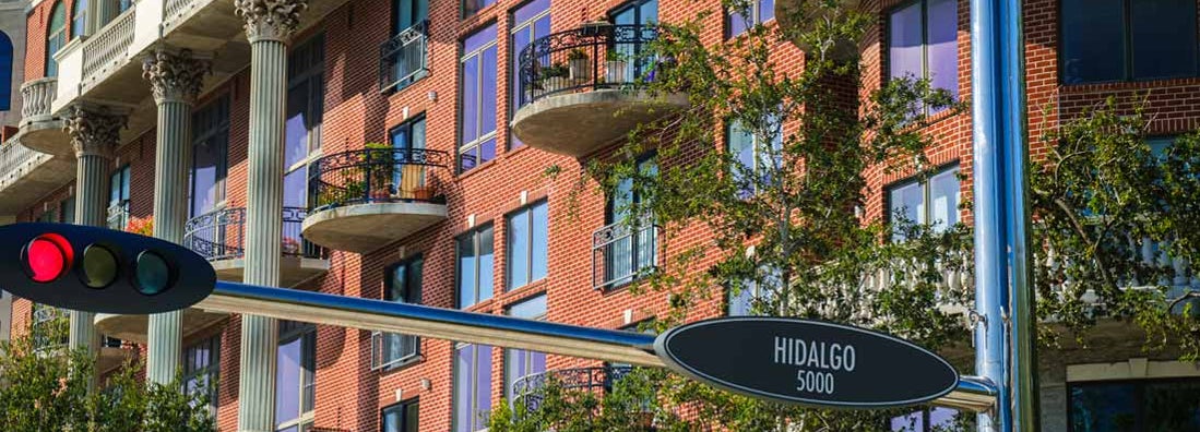 Cityscape sign view in the uptown Houston, Texas business district. Find Texas Condo Insurance.