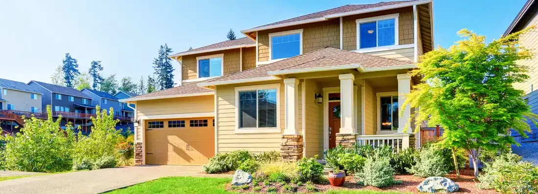 Beautiful curb appeal of luxury beige house. Narragansett, Rhode Island Homeowners Insurance. 