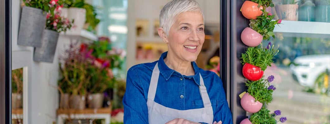 small business owner looking out window