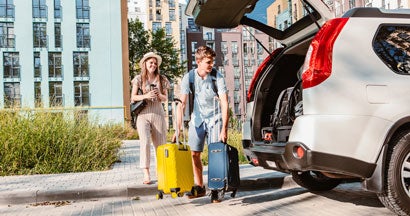 Couple gathering for road trip. Rental Car Insurance: Is It Worth It? 