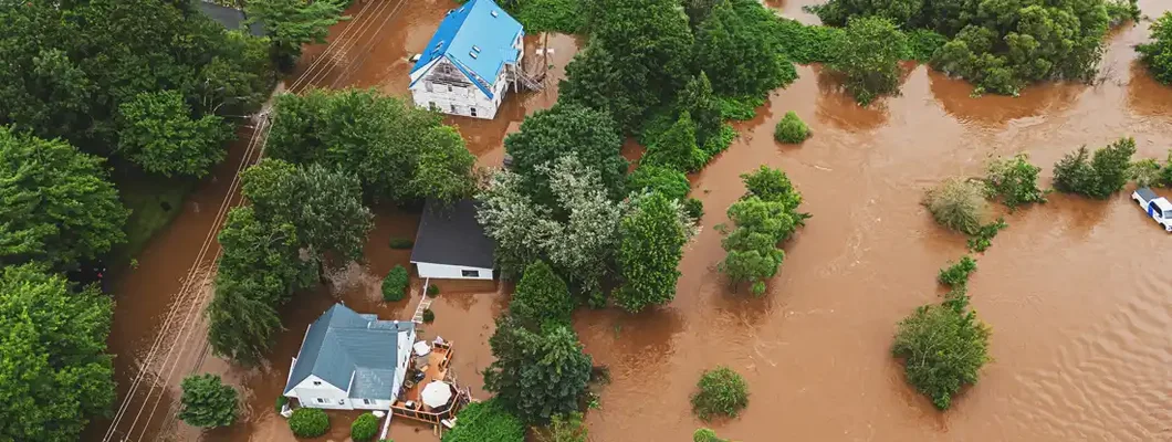 Aerial view of homes flooded by record breaking rainfall. Find Kentucky Flood Insurance.