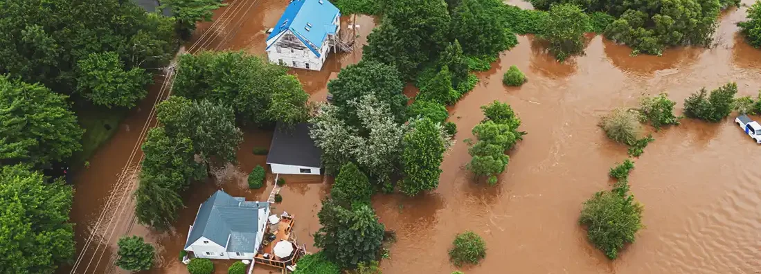 Aerial view of homes flooded by record breaking rainfall. Find Kentucky Flood Insurance.