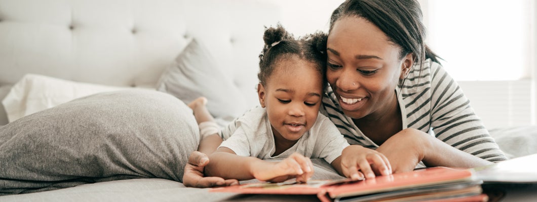 Mom reading to toddler