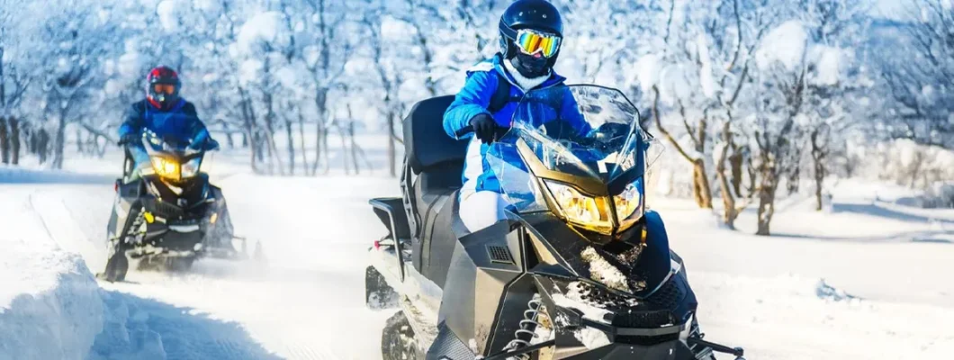 Snowmobile fun in the winter. Find Snowmobile Insurance Cost.