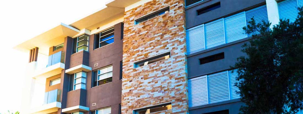 Modern apartment building in dusk sunlight