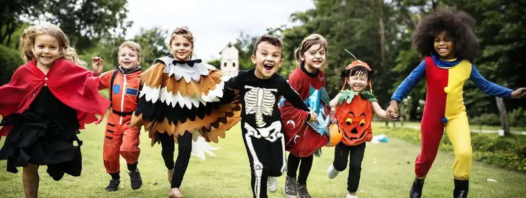 Little kids at a Halloween party. 10 Halloween Safety Tips for a Spooky but Peaceful Night.