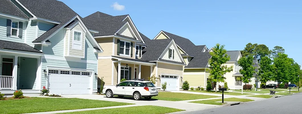 Homes in suburban neighborhood. Find Massachusetts umbrella insurance.