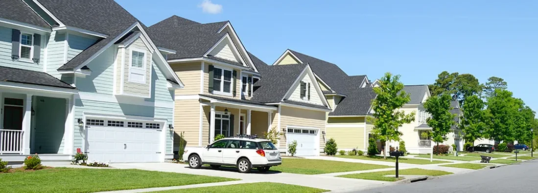 Homes in suburban neighborhood. Find Massachusetts umbrella insurance.