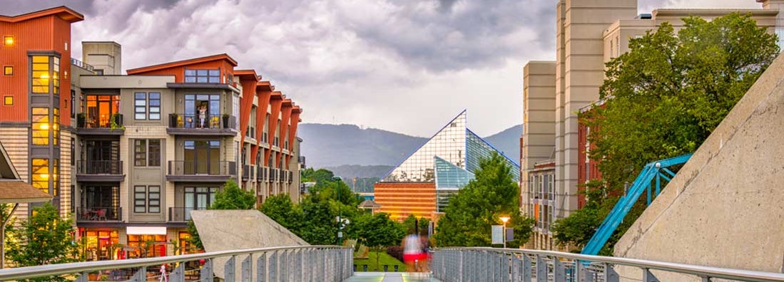 Chattanooga, Tennessee downtown walking path and cityscape at twilight. Find Tennessee renters insurance.