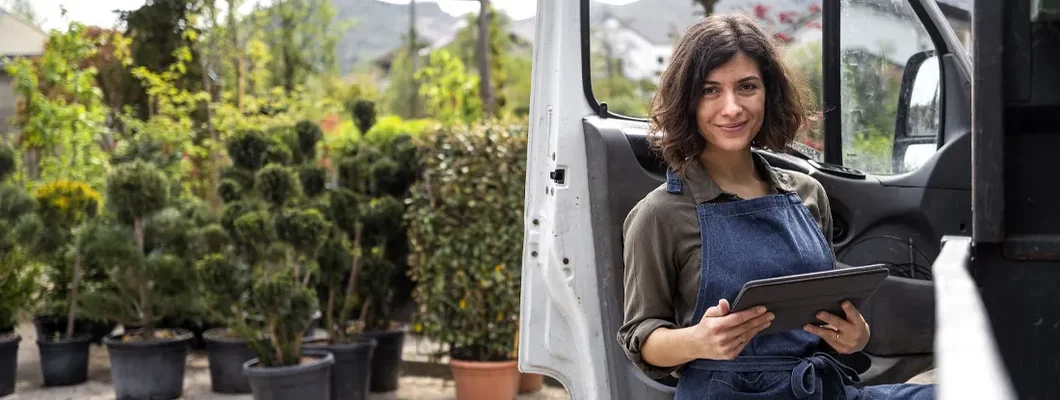 Female Gardener Preparing for Delivery. Find Commercial Vehicle Insurance Discounts.