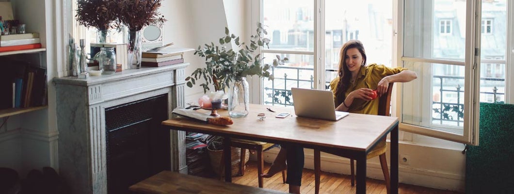 Landlord woman relaxing in her Alabama apartment. Find Alabama landlord insurance.