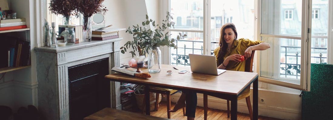 Landlord woman relaxing in her Alabama apartment. Find Alabama landlord insurance.