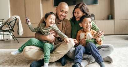 Family at home. 11 Biggest Insurance Myths Debunked.