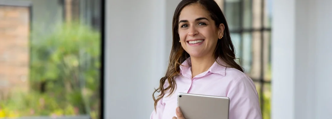 Happy landlord showing a house. Get Landlord Insurance Quotes.