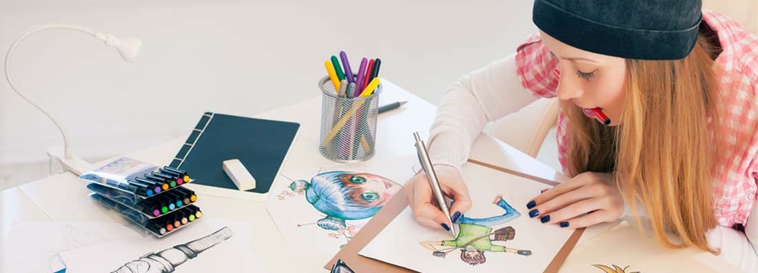 Young female artist painting in art studio.