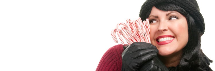 Woman Holding Candy Canes