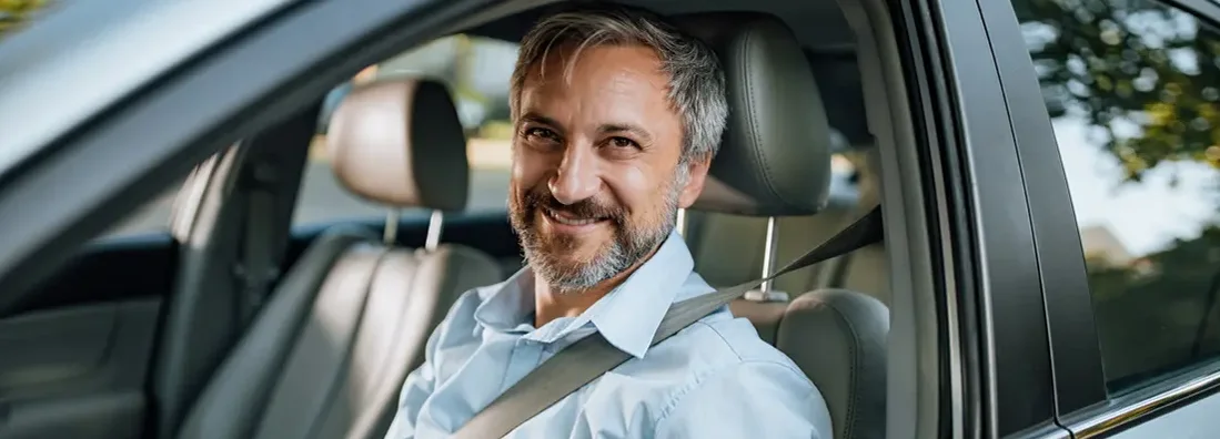 Man waits for his wife to go shopping together. Find Stamford, Connecticut car insurance. 