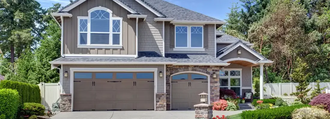 Home exterior with garage and driveway. Broadview Heights, OH Homeowners Insurance.