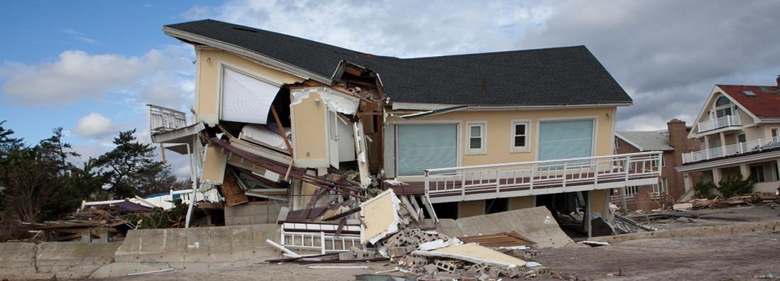 Damaged home after Hurricane Sandy. Find hurricane aftermath insurance.