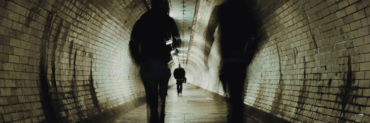 Man being stalked in tunnel