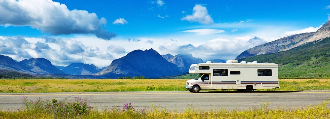 RV Camper vehicle at Glacier National Park, Montana. Find Montana RV Insurance.