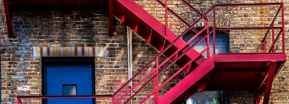 Photo of a colorful fire escape in Tampa Florida. Find fire escape contractor insurance.