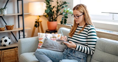 Woman spends her free time at home drawing. Should I rent or buy a condo?