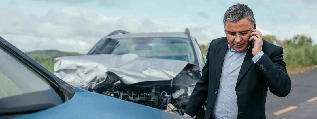 Man worried after hitting another car in traffic. Find Property Damage Liability Coverage.