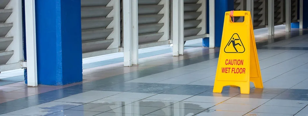 Yellow Caution Wet Floor Sign. Find Premises Liability Insurance. 