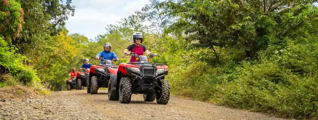 Group of tourists driving ATVs. Find ATV Insurance Claims.